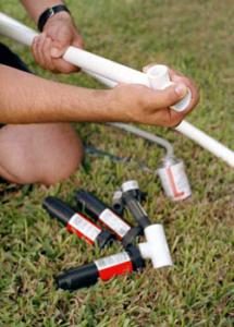 a contractor assembles the underground pvc line 